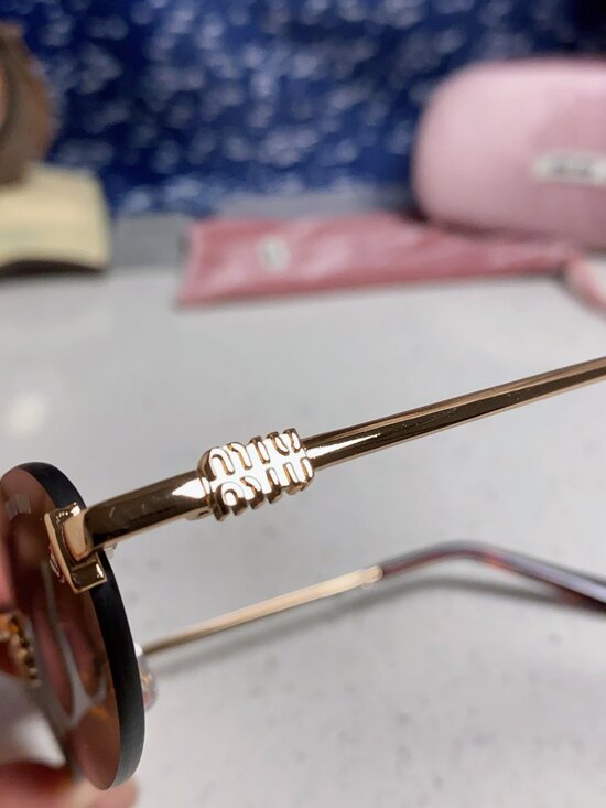 New Miu Miu Sunglasses 2026 for Women | LookerOnline  Miu Miu 2026 New Women\'s Rimless Sunglasses